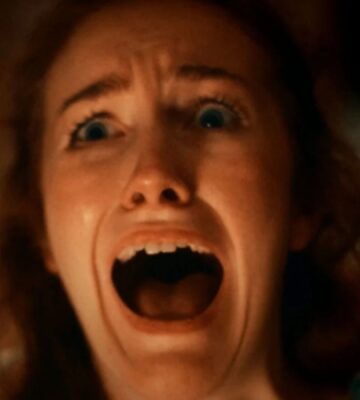 A screenshot from an anti-dairy advert by animal rights group Viva! showing a woman screaming