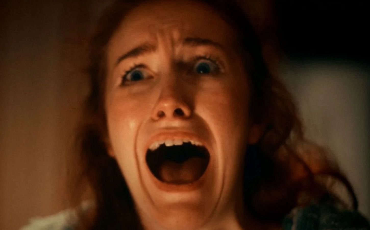 A screenshot from an anti-dairy advert by animal rights group Viva! showing a woman screaming