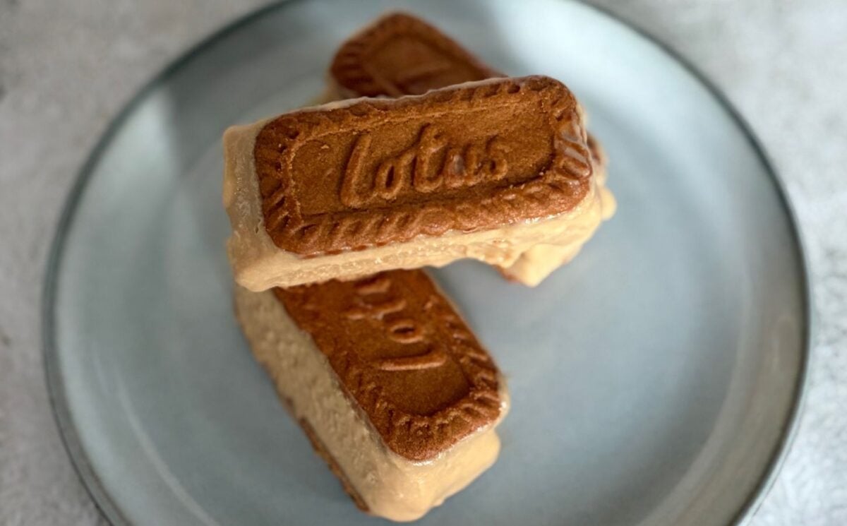 a plate of small biscoff ice cream sandwiches stacked on one another