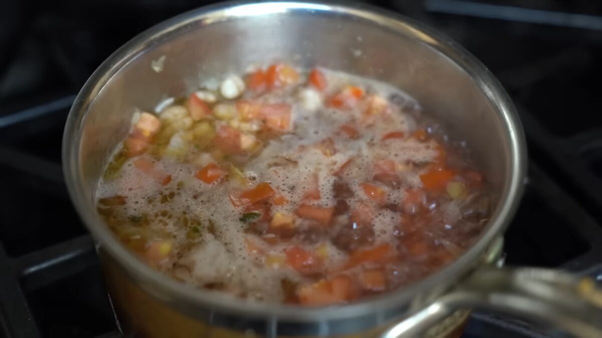 With these tomato and herb beans simmering in a steel pot, Miyoko Schinner is making beans sexy again