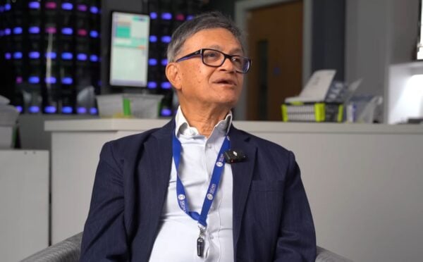 Photo shows Sigma Pharmaceuticals founder Dr Bharat Shah, in conversation with Plant Based News founder Klaus Mitchell about the healthcare industry, diet, and autoimmune diseases