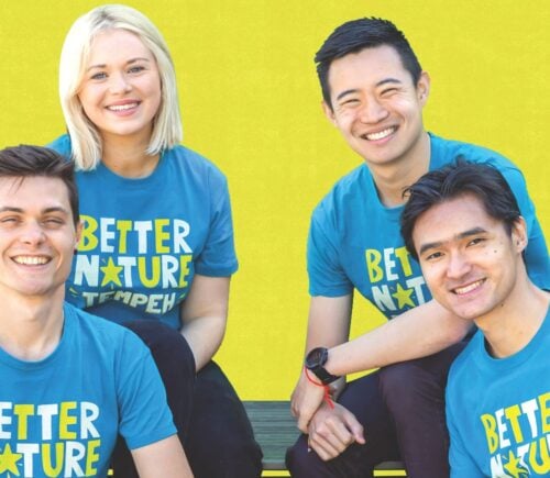 Photo shows the Better Nature co-founders wearing matching t-shirts bearing the brand's name and logo