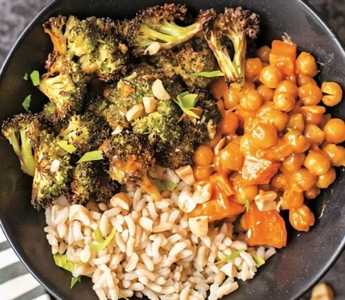 crunchy roasted chickpeas and veggies with peanut sauce, served with rice