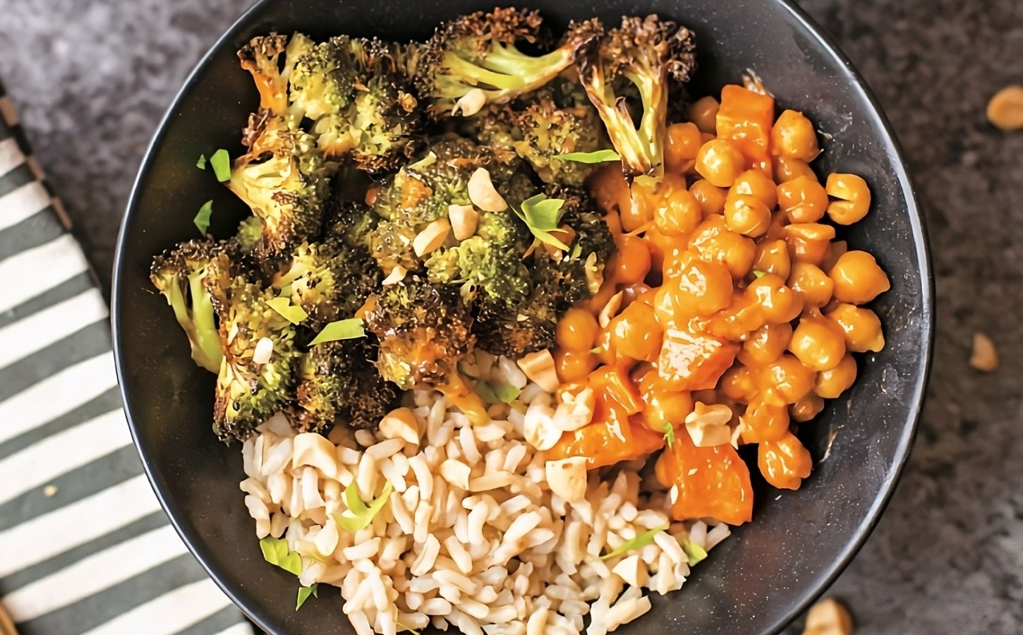 crunchy roasted chickpeas and veggies with peanut sauce, served with rice
