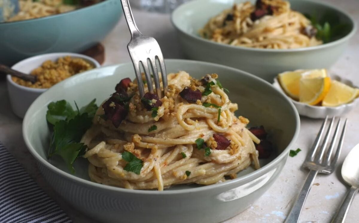 Shot of a creamy carbonara pasta, one of the easy vegan meal prep for back-to-school ideas that Claiborne explains how to make