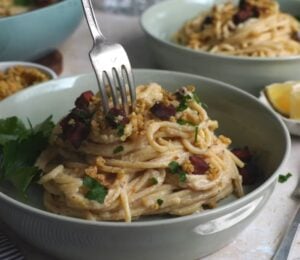 Shot of a creamy carbonara pasta, one of the easy vegan meal prep for back-to-school ideas that Claiborne explains how to make