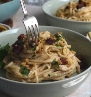 Shot of a creamy carbonara pasta, one of the easy vegan meal prep for back-to-school ideas that Claiborne explains how to make