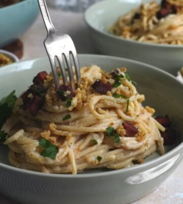Shot of a creamy carbonara pasta, one of the easy vegan meal prep for back-to-school ideas that Claiborne explains how to make
