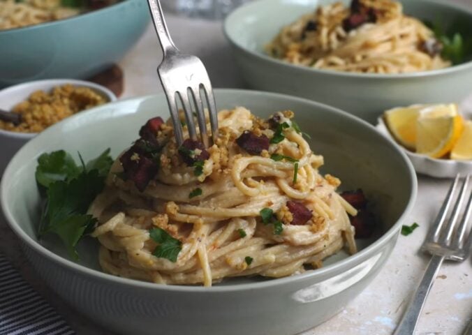Shot of a creamy carbonara pasta, one of the easy vegan meal prep for back-to-school ideas that Claiborne explains how to make