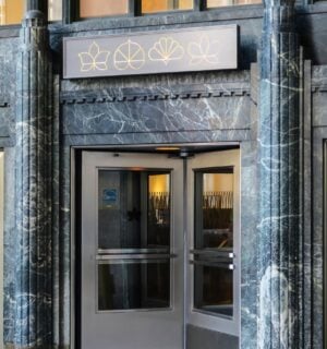 The outside entrance of vegan restaurant Eleven Madison Park in NYC