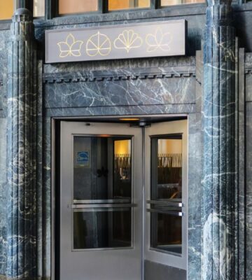 The outside entrance of vegan restaurant Eleven Madison Park in NYC