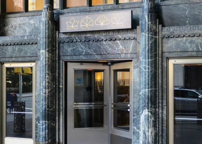 The outside entrance of vegan restaurant Eleven Madison Park in NYC