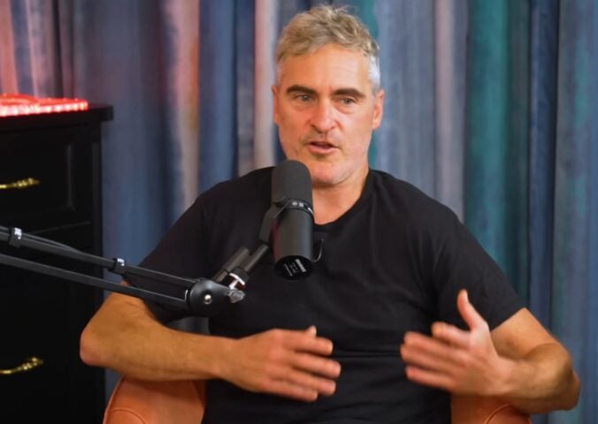 Photo show's Joaquin Phoenix speaking to Theo Von on his This Past Weekend podcast