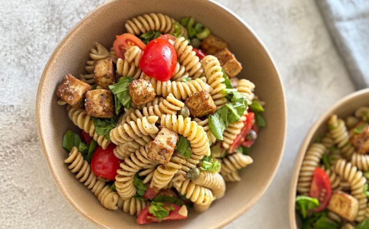 A bowl of olive paste pasta salad