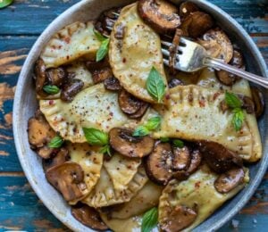 tofu ricotta ravioli with a creamy mushroom sauce