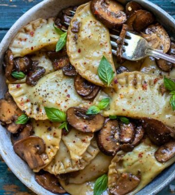 tofu ricotta ravioli with a creamy mushroom sauce