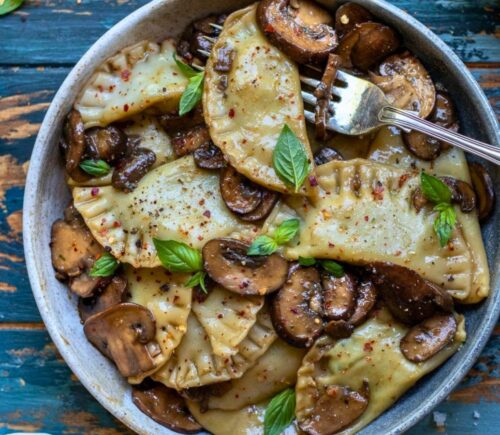 tofu ricotta ravioli with a creamy mushroom sauce