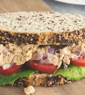Caesar smashed chickpea sandwiches with tomato and lettuce for vegan lunchbox ideas kids will love