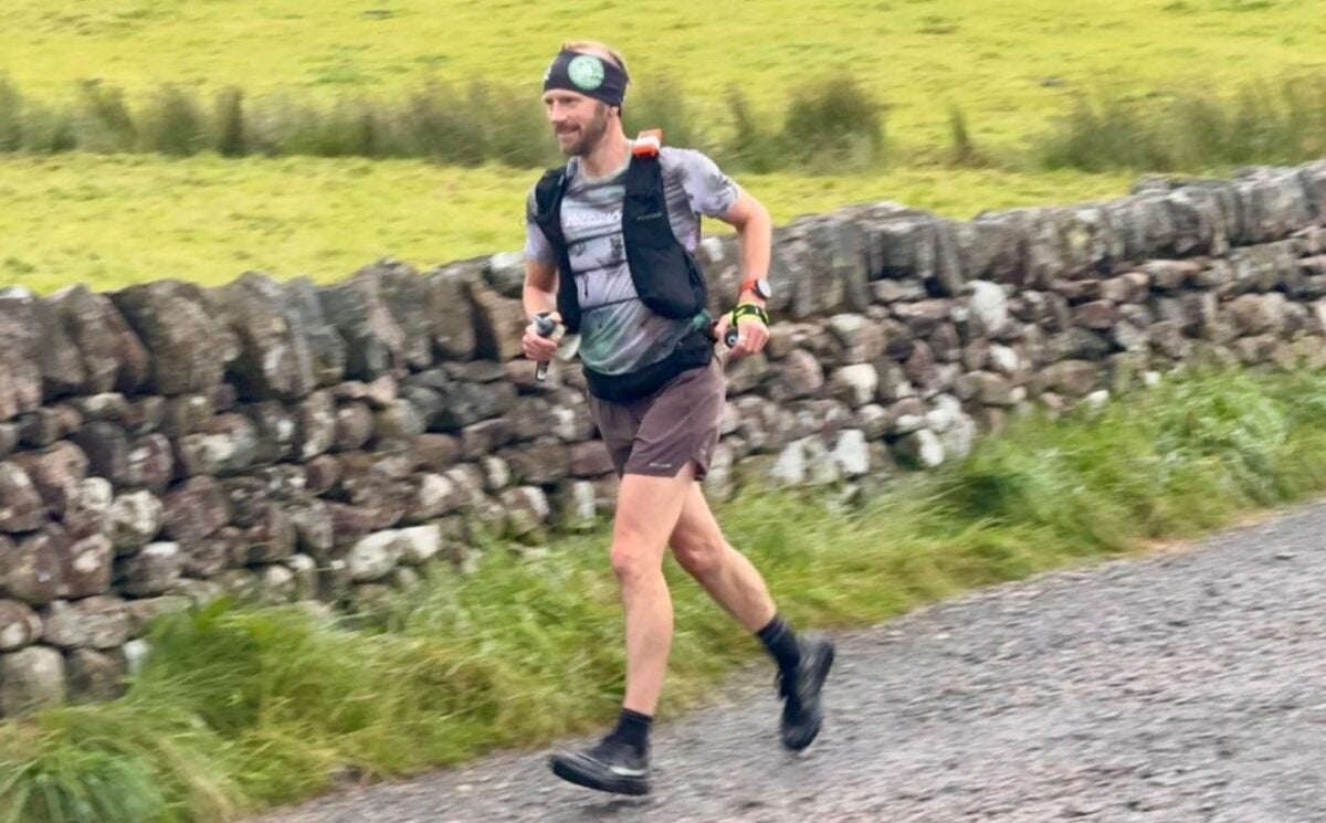 Photo shows vegan runner Damian Hall competing in the Lakeland 100 earlier this year