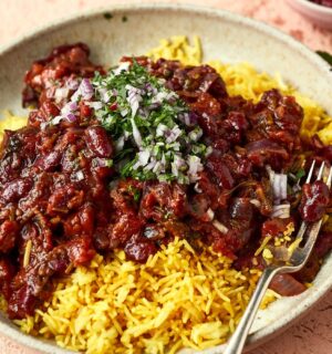 a bowl of Afghan-style bean curry over yellow basmati rice