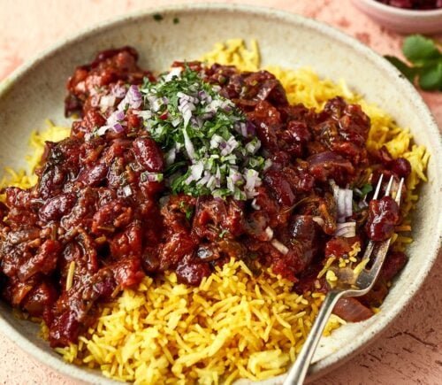 a bowl of Afghan-style bean curry over yellow basmati rice