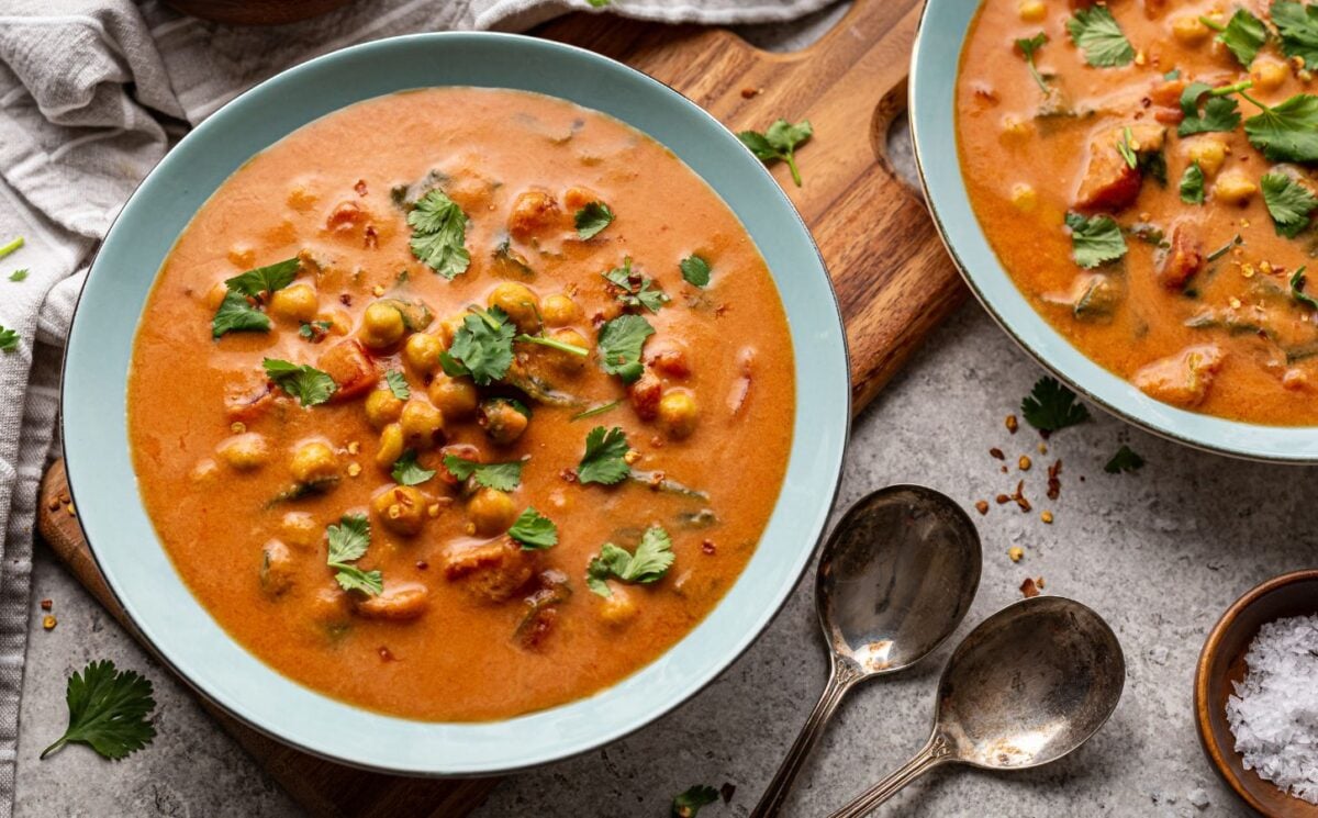chickpea masala tomato soup with chili, coconut milk, and curry spices