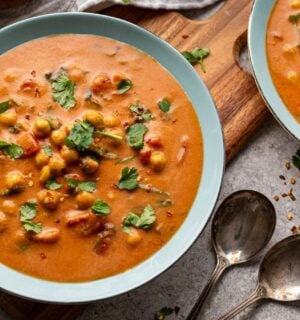 chickpea masala tomato soup with chili, coconut milk, and curry spices