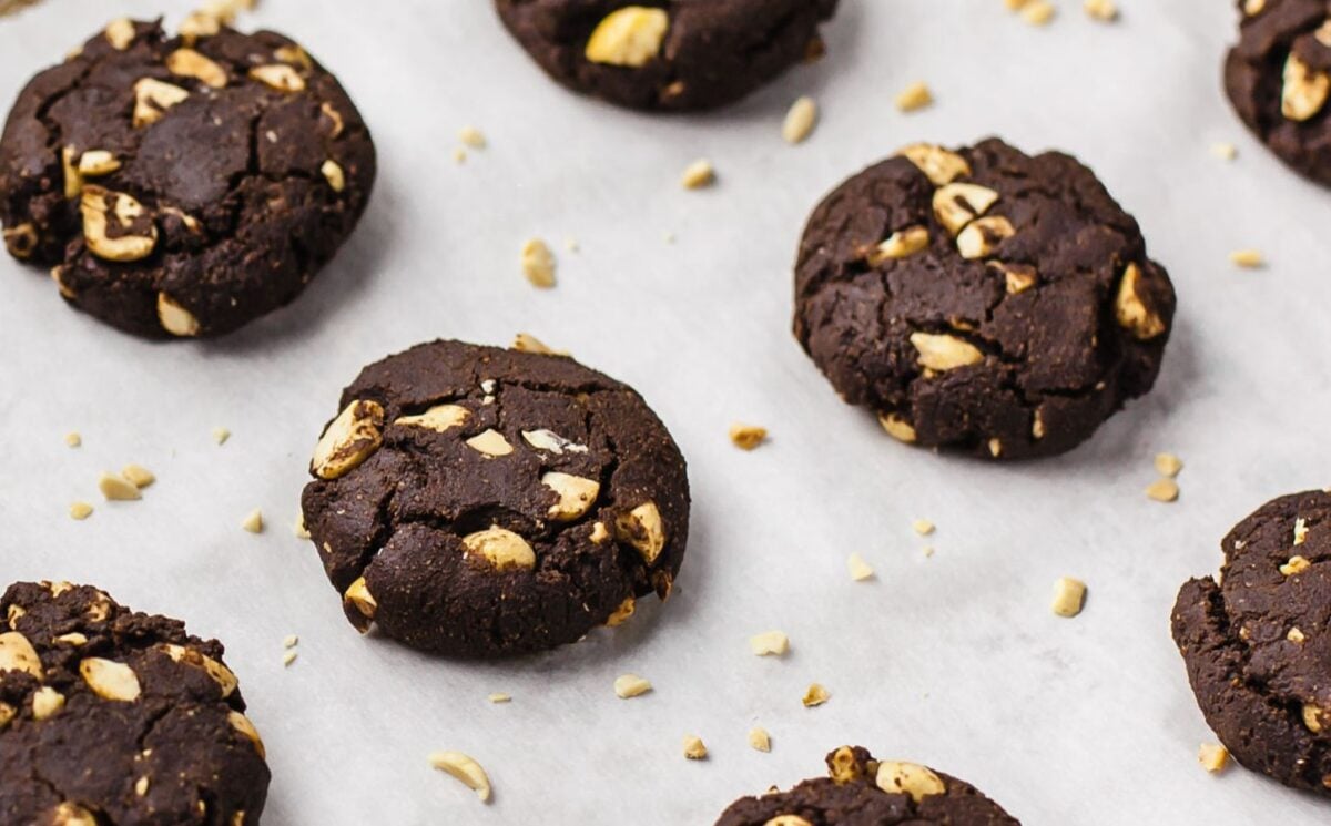 chocolate peanut cookies with almond flour, oats, nut butter, and raw peanuts