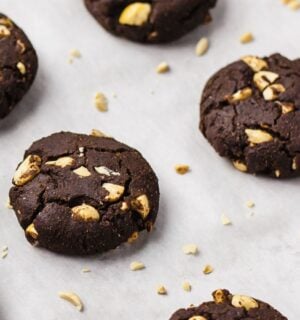 chocolate peanut cookies with almond flour, oats, nut butter, and raw peanuts