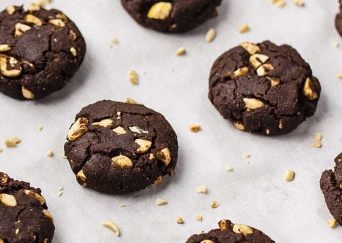 chocolate peanut cookies with almond flour, oats, nut butter, and raw peanuts