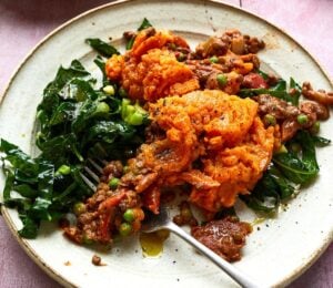 lentil and sweet potato cottage pie served with stir-fried greens