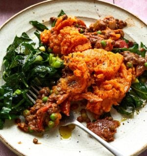 lentil and sweet potato cottage pie served with stir-fried greens