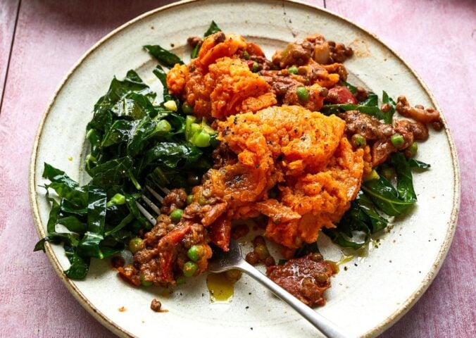 lentil and sweet potato cottage pie served with stir-fried greens