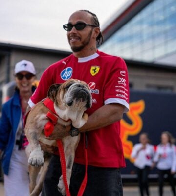 Photo shows Lewis Hamilton and his dog Roscoe at Silverstone in July, 2025