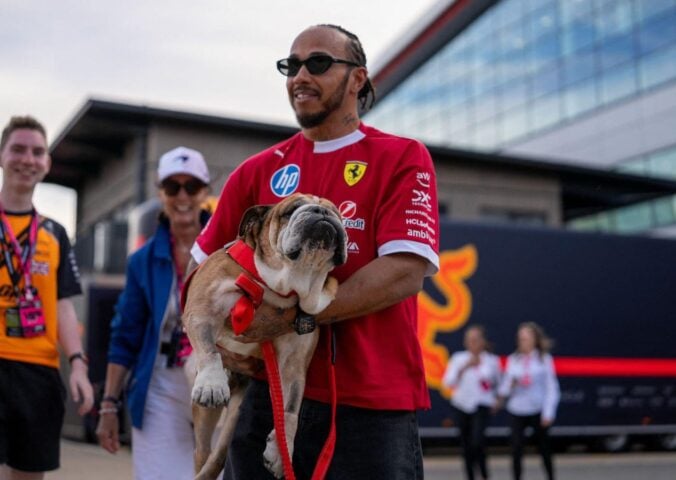 Photo shows Lewis Hamilton and his dog Roscoe at Silverstone in July, 2025