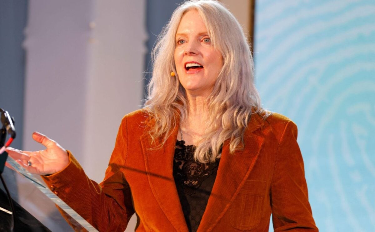 Photo shows Maggie Baird, founder of plant-based food advocacy nonprofit Support + Feed, speaking at the annual Captain Planet Foundation Gala in Atlanta earlier this year