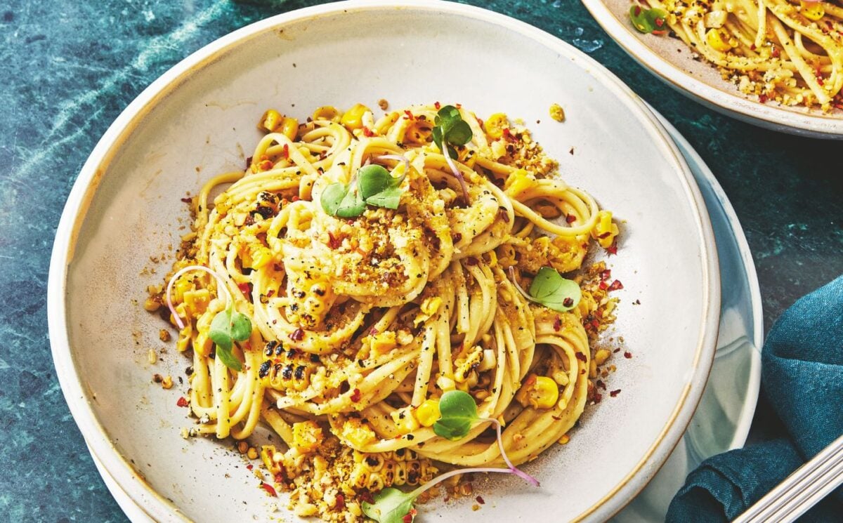 a bowl of miso creamy corn pasta with nutritional yeast for recipes that use September produce
