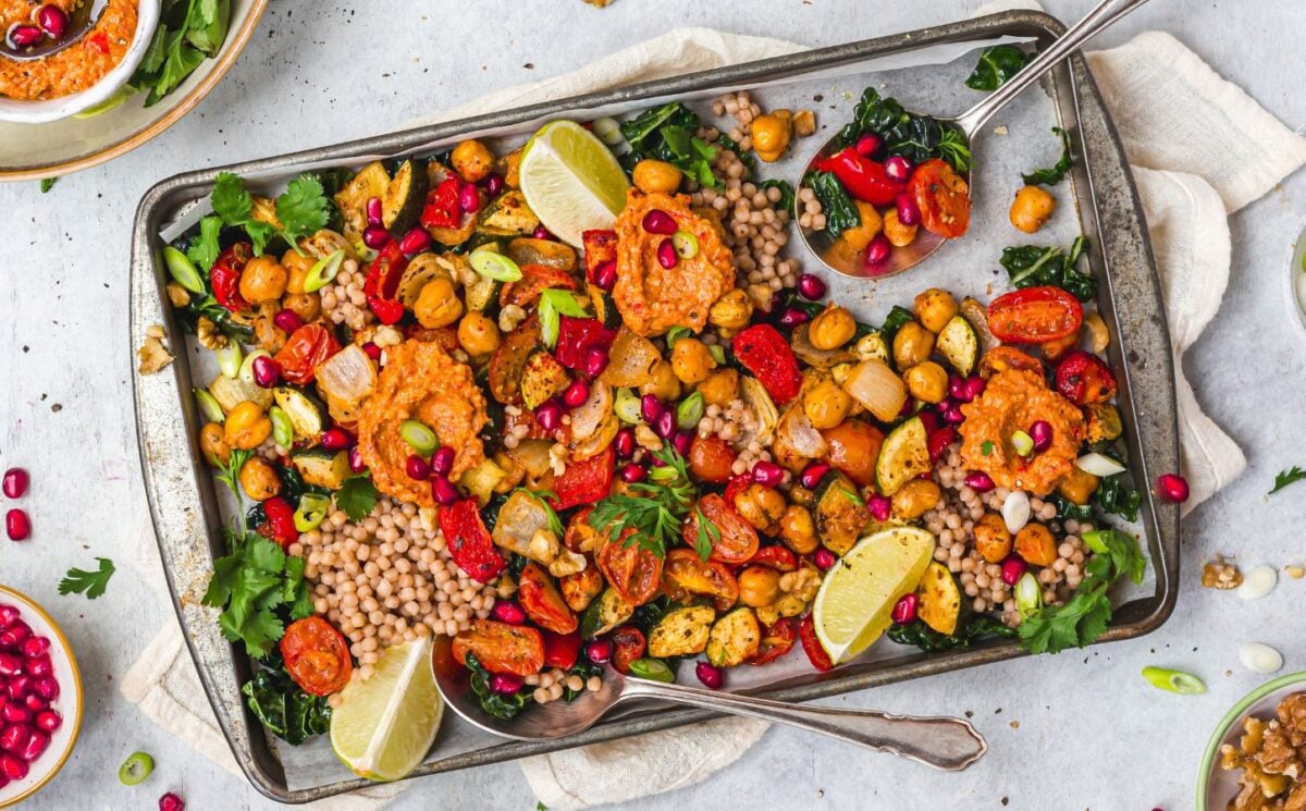 a picture of a red pepper pesto chickpea traybake for high-protein sheet pan meals