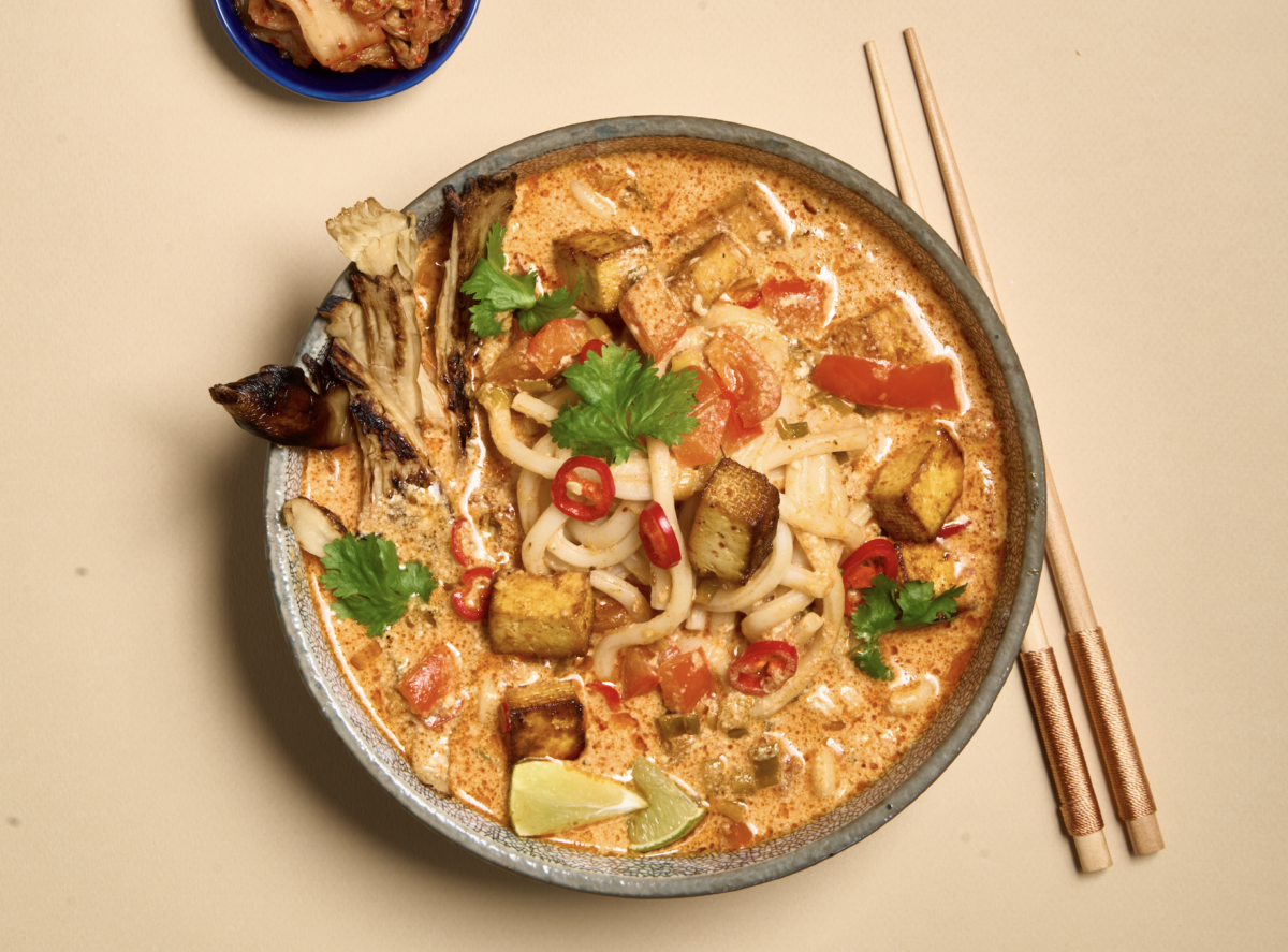 Photo shows a curry-based dish made with chickpea tofu by THIS