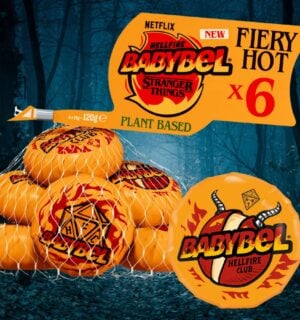Photo shows the new Babybel x Stranger Things vegan cheese wheels in "fiery hot" Hellfire flavor