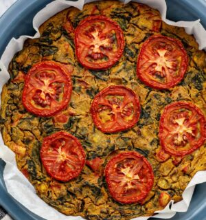 vegan gluten-free quiche florentine with nutritional yeast, veggies, and spices