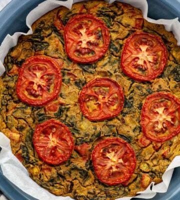 vegan gluten-free quiche florentine with nutritional yeast, veggies, and spices