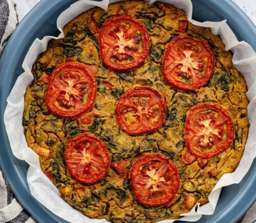 vegan gluten-free quiche florentine with nutritional yeast, veggies, and spices