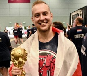 Photo shows vegan athlete Tom Butts, who was just crowned Natural World's Strongest Man for the third consecutive year