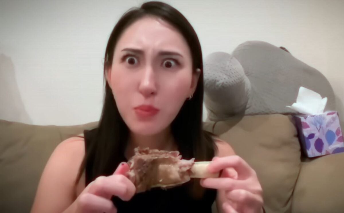 Perfect Carnivore influencer Steak and Butter Gal eating meat off a bone, promoting her meat-only diet