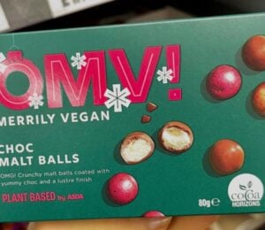 Photo shows a box of Asda's new vegan Maltesers, the OMV! Choc Malt Balls