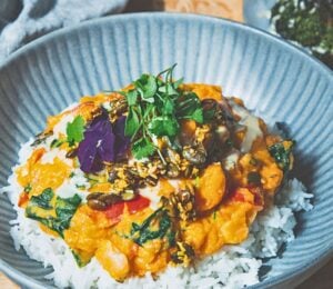 butter bean and sweet papas coconut stew with spicy and sweet coconut pepitas