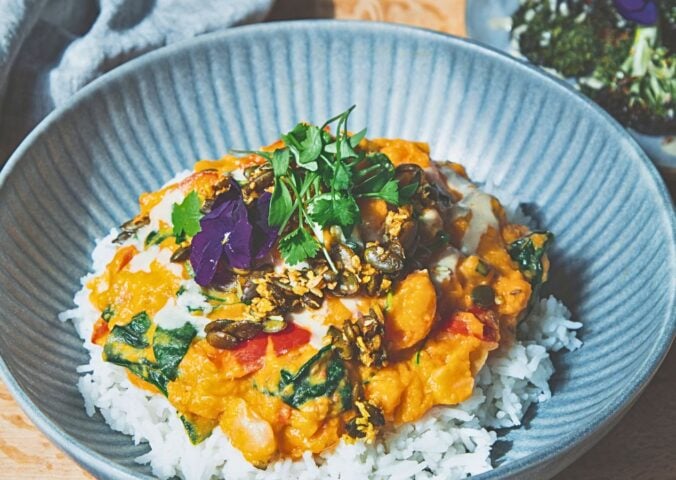 butter bean and sweet papas coconut stew with spicy and sweet coconut pepitas