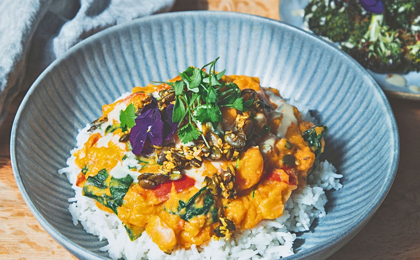 butter bean and sweet papas coconut stew with spicy and sweet coconut pepitas