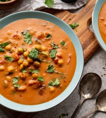 chickpea masala tomato soup with chili, coconut milk, and curry spices for vegan soup recipes